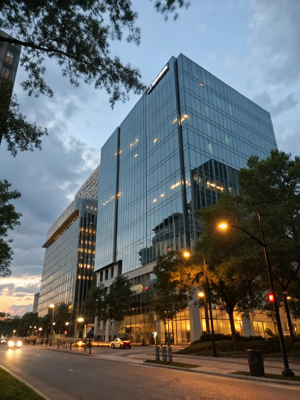 A newly constructed commercial building with glass facade, symbolizing commercial real estate loans provided by Irongate Lending.